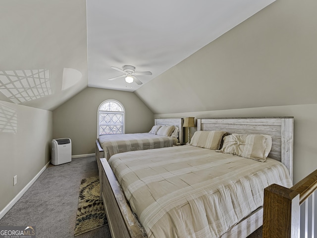 bedroom featuring vaulted ceiling, carpet, a ceiling fan, and baseboards