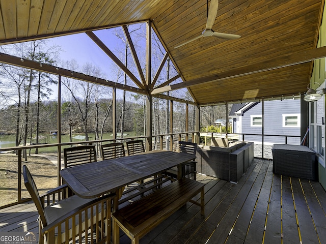 exterior space featuring lofted ceiling, wooden ceiling, and ceiling fan