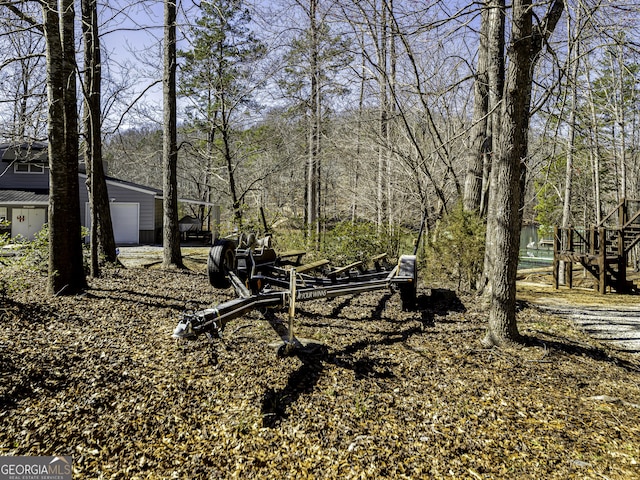 view of yard with a garage