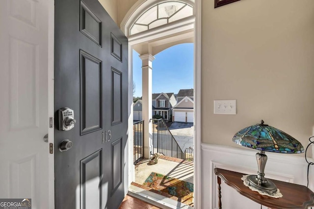 entrance foyer featuring decorative columns