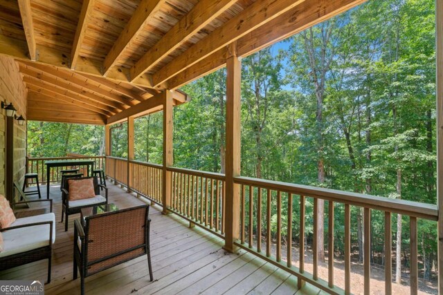 deck featuring outdoor dining space