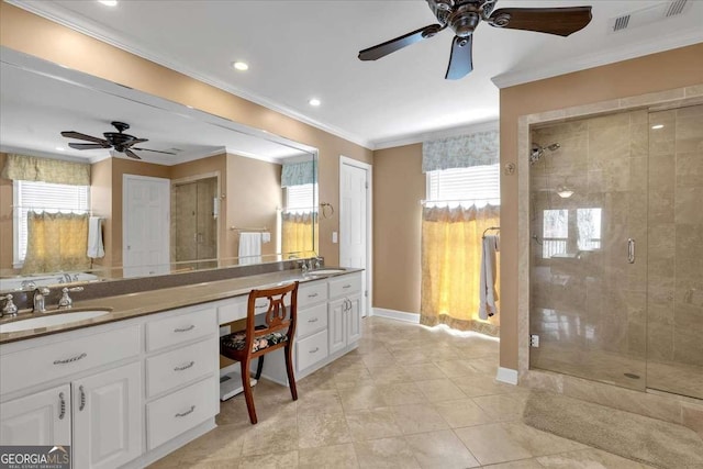 full bath with a shower stall, a sink, and crown molding