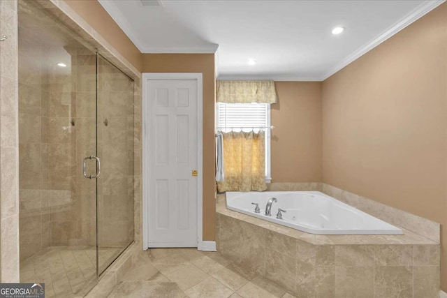 bathroom featuring crown molding, a shower stall, and a bath