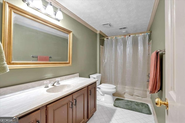 bathroom with toilet, ornamental molding, vanity, and visible vents