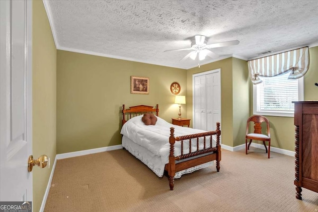 bedroom featuring light colored carpet, a closet, visible vents, and baseboards