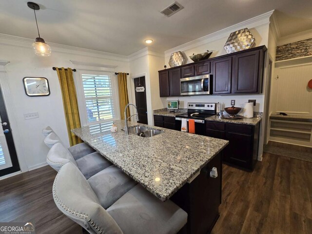 kitchen with electric stove, crown molding, stainless steel microwave, visible vents, and a sink