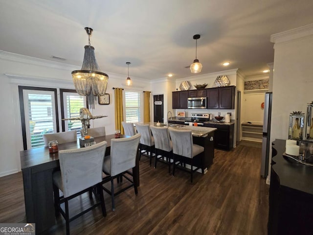 dining area featuring a chandelier, dark wood finished floors, visible vents, and crown molding