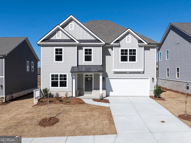 view of front of house with a garage, a shingled roof, concrete driveway, a standing seam roof, and board and batten siding