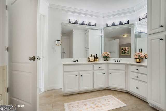 484 Martin St SE, Atlanta, GA 30312 - bathroom featuring tile patterned flooring, a sink, crown molding, and double vanity