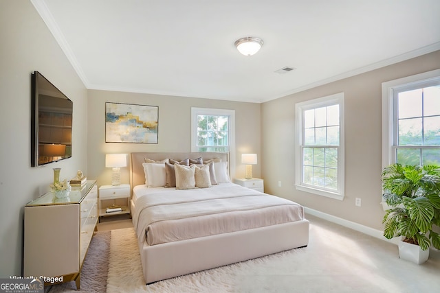 484 Martin St SE, Atlanta, GA 30312 - carpeted bedroom featuring visible vents, crown molding, and baseboards