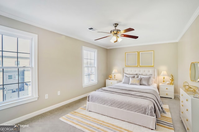 484 Martin St SE, Atlanta, GA 30312 - bedroom featuring visible vents, light carpet, a ceiling fan, crown molding, and baseboards