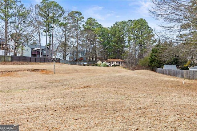 view of yard with fence