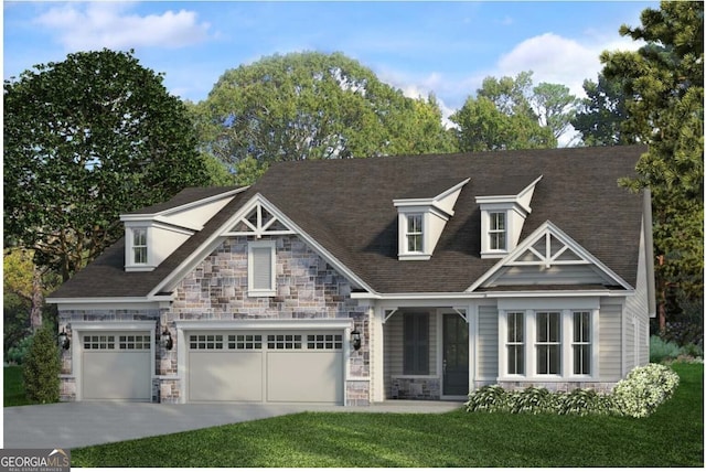 view of front of home with stone siding, a front lawn, an attached garage, and driveway