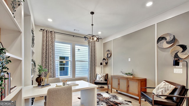 interior space with a notable chandelier, light wood-style flooring, visible vents, and recessed lighting