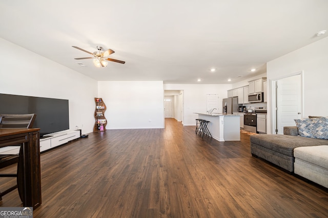 2030 Vidalia Ct, Dacula, GA 30019 - living area featuring a ceiling fan, dark wood finished floors, baseboards, and recessed lighting