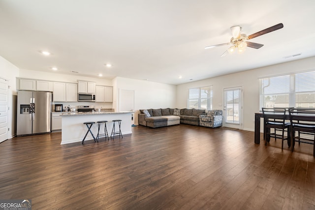 2030 Vidalia Ct, Dacula, GA 30019 - living room featuring a ceiling fan, dark wood finished floors, recessed lighting, and baseboards