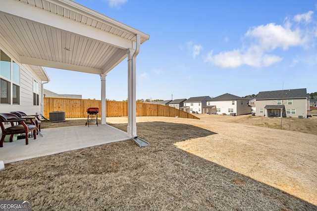 2030 Vidalia Ct, Dacula, GA 30019 - view of yard with a residential view, a patio, and central AC