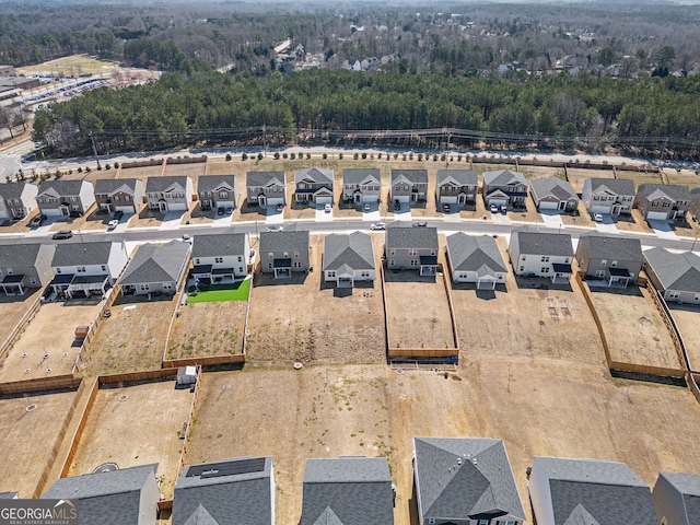 2030 Vidalia Ct, Dacula, GA 30019 - aerial perspective of suburban area with a heavily wooded area
