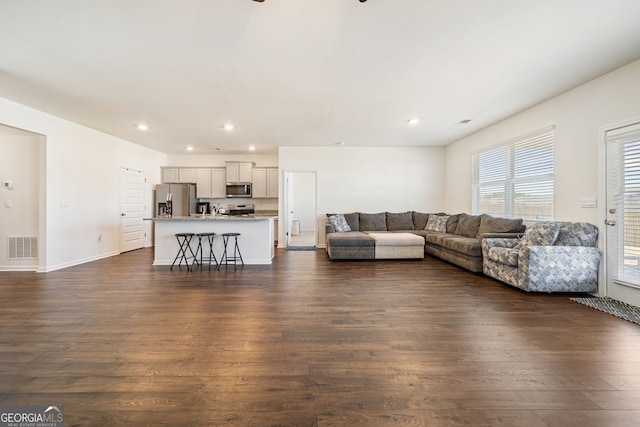 2030 Vidalia Ct, Dacula, GA 30019 - living room with dark wood finished floors, recessed lighting, baseboards, and a ceiling fan