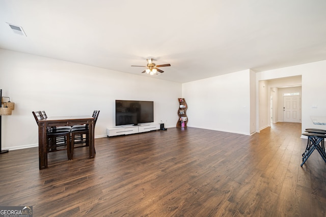 2030 Vidalia Ct, Dacula, GA 30019 - living area featuring ceiling fan, dark wood-type flooring, and baseboards
