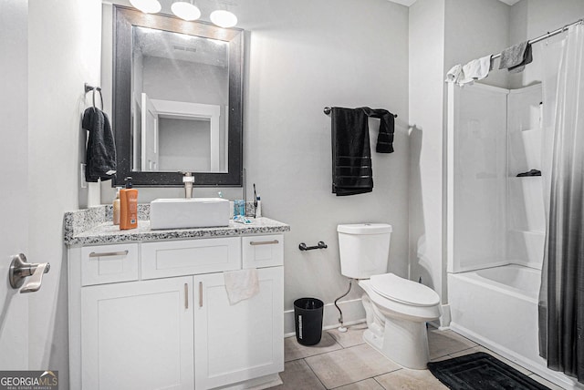 full bathroom featuring baseboards, toilet, shower / tub combo, tile patterned floors, and vanity