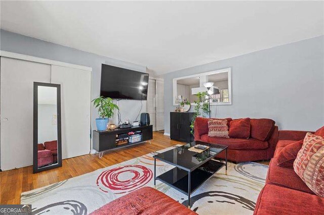 living area with wood finished floors