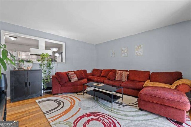 living room with wood finished floors