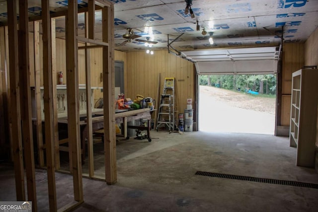 garage with wood walls