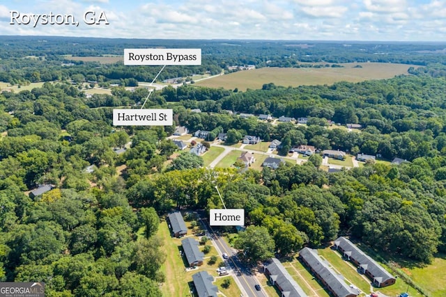 aerial view featuring a view of trees