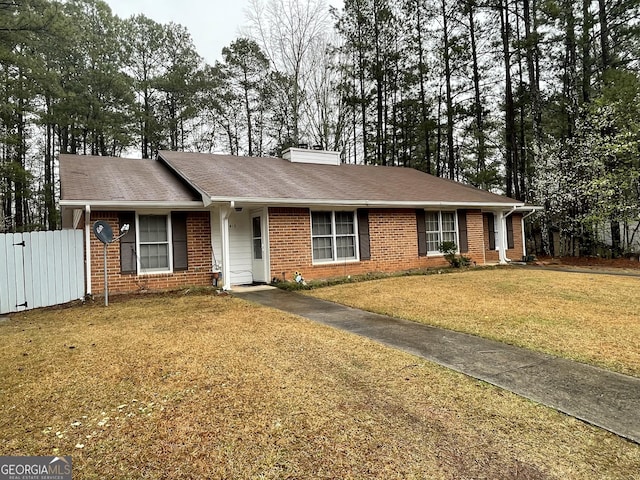 405415 Chase Dr, Fayetteville, GA 30214 - ranch-style house with brick siding, a chimney, and a shingled roof