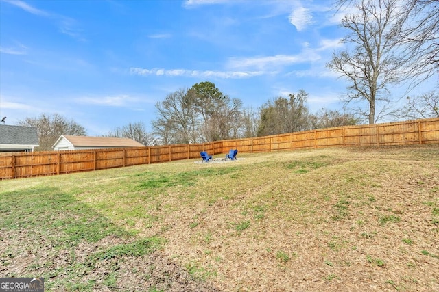 view of yard with a fenced backyard