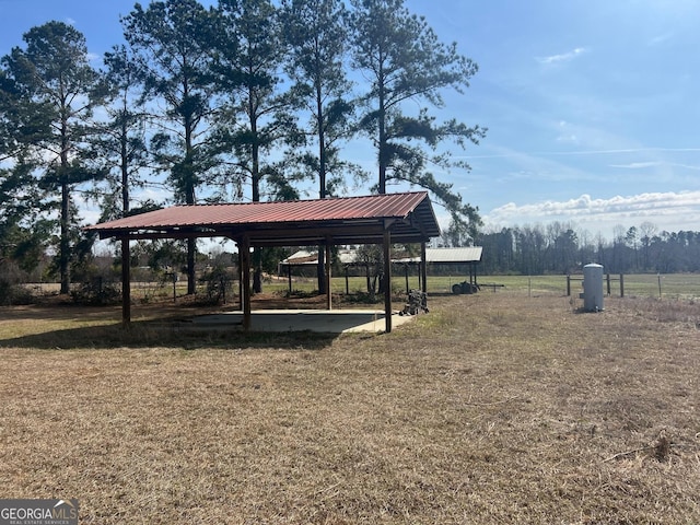 view of home's community featuring a detached carport, a lawn, and a gazebo