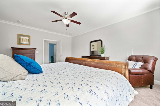 carpeted bedroom featuring ceiling fan and ornamental molding