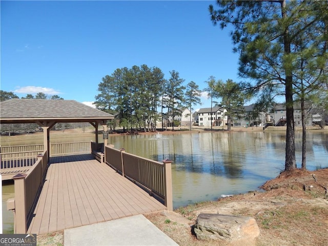 dock area featuring a gazebo and a water view