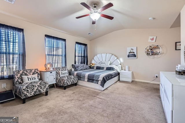 carpeted bedroom with ceiling fan, baseboards, visible vents, and vaulted ceiling