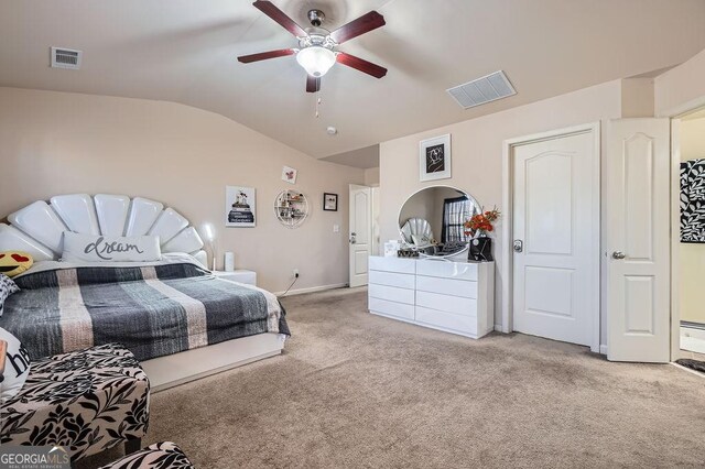 bedroom with arched walkways, lofted ceiling, visible vents, and light carpet