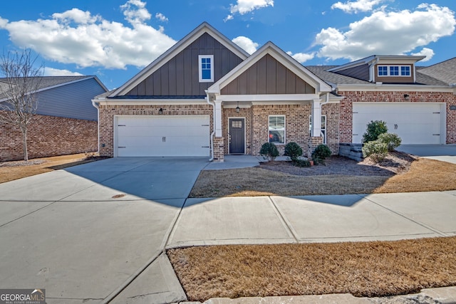 craftsman-style home with a garage, brick siding, concrete driveway, roof with shingles, and board and batten siding