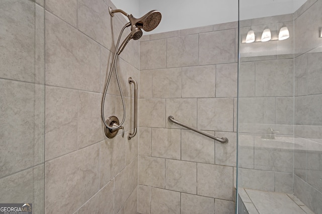 bathroom featuring tiled shower