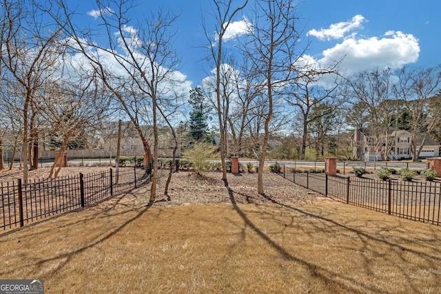 view of yard featuring fence