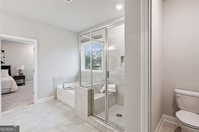 full bathroom featuring connected bathroom, a garden tub, toilet, baseboards, and a stall shower