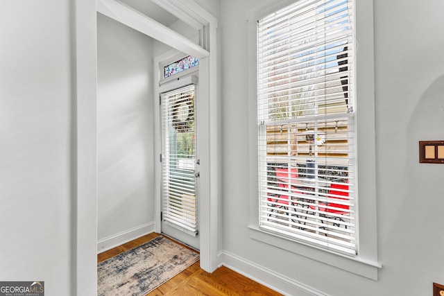 doorway with baseboards