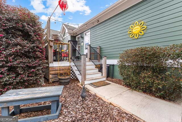 view of home's exterior featuring a deck