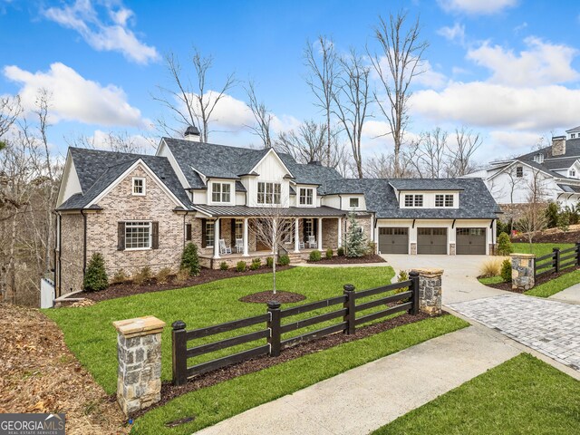 310 Timberview Trl, Alpharetta, GA 30004 - view of front of property with fence private yard, driveway, a porch, and a front yard