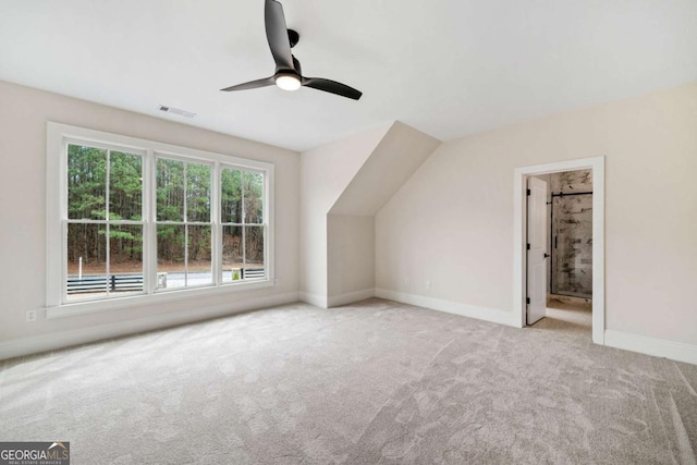 bonus room featuring ceiling fan, carpet flooring, visible vents, and baseboards