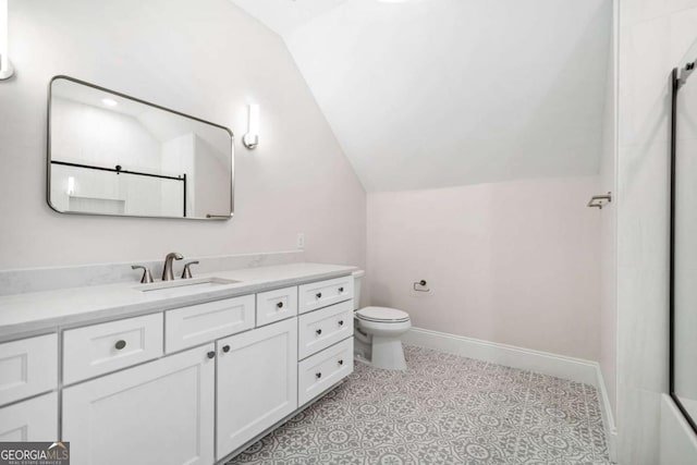 bathroom featuring baseboards, a shower, toilet, vaulted ceiling, and vanity