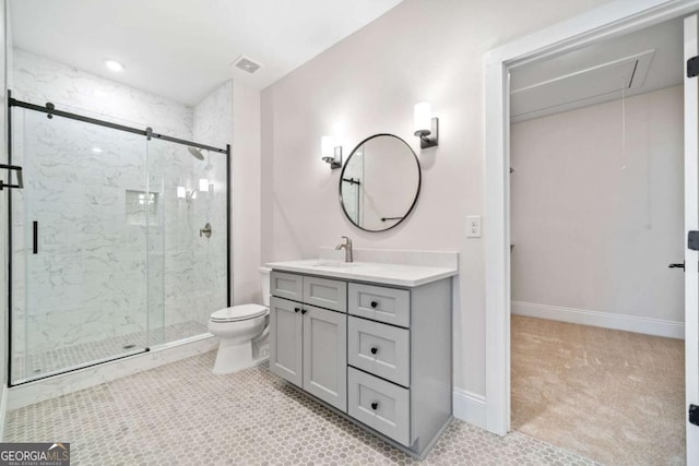 bathroom featuring a marble finish shower, baseboards, visible vents, toilet, and vanity