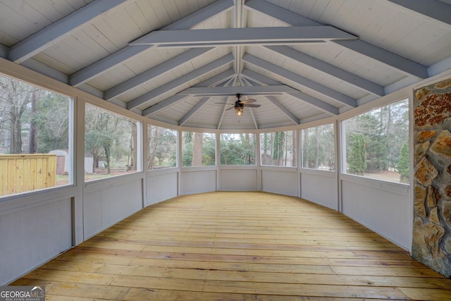 unfurnished sunroom with vaulted ceiling with beams, wood ceiling, and a ceiling fan