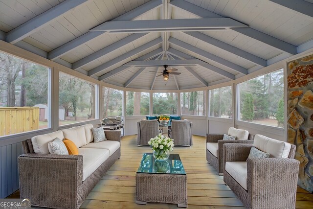 2809 Fieldstone Dr SE, Conyers, GA 30013 - back of property with a chimney, a wooden deck, a sunroom, and roof with shingles