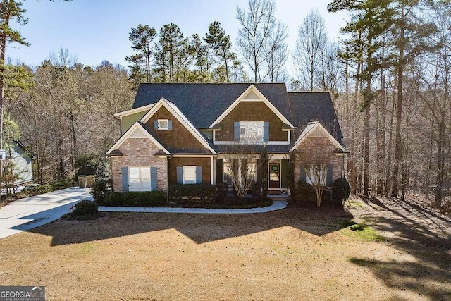 view of front of house featuring brick siding