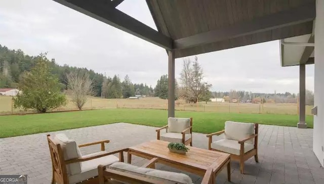 view of patio featuring a rural view and outdoor lounge area